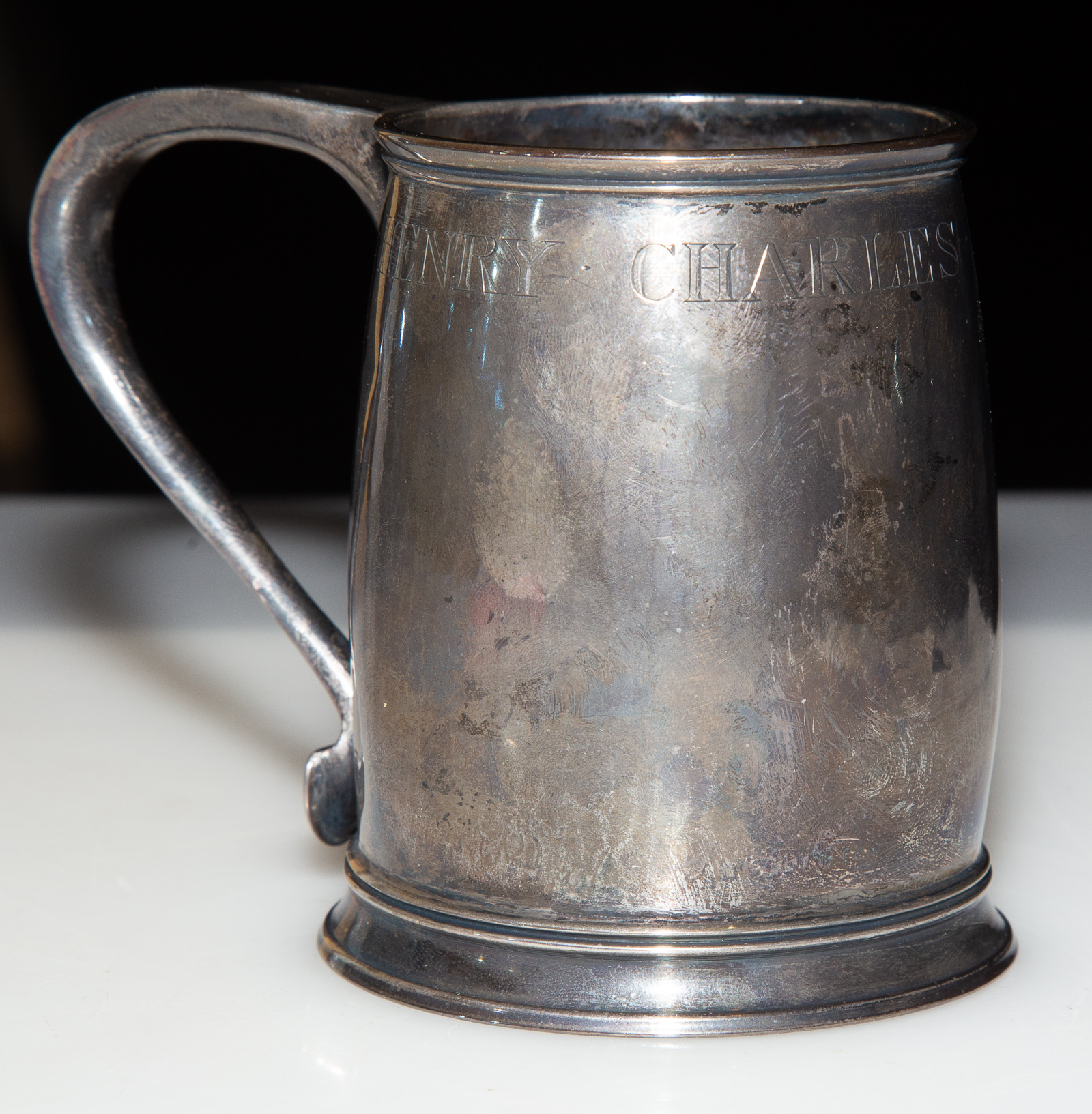 Appraisal: STERLING SILVER MUG Inscribed around the rim Henry Charles Renouf