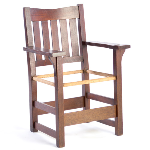 Appraisal: GUSTAV STICKLEY Early armchair with horizontal backslats under a V-shaped