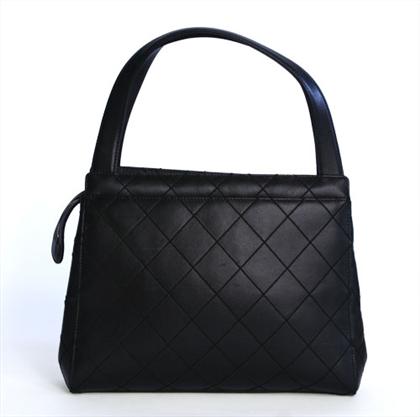 Appraisal: Black leather Chanel handbag Small tote-style bag in matte black