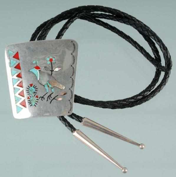 Appraisal: Native American Indian Silver Pendant on String Description Bulo with