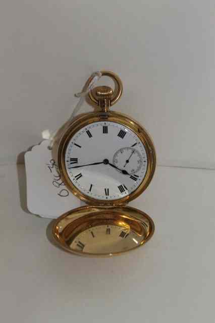 Appraisal: AN CT GOLD HUNTER POCKET WATCH with top wind mechanism