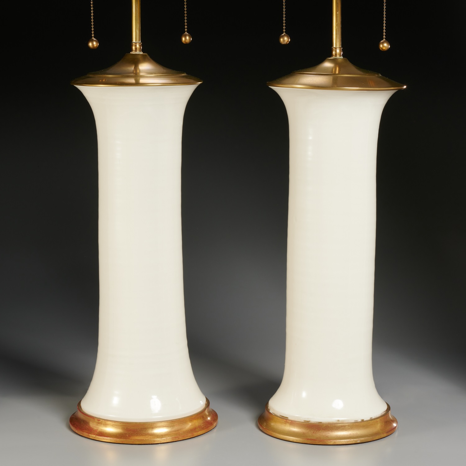 Appraisal: CHRISTOPHER SPITZMILLER PAIR PATRICIA LAMPS st c American cream glazed