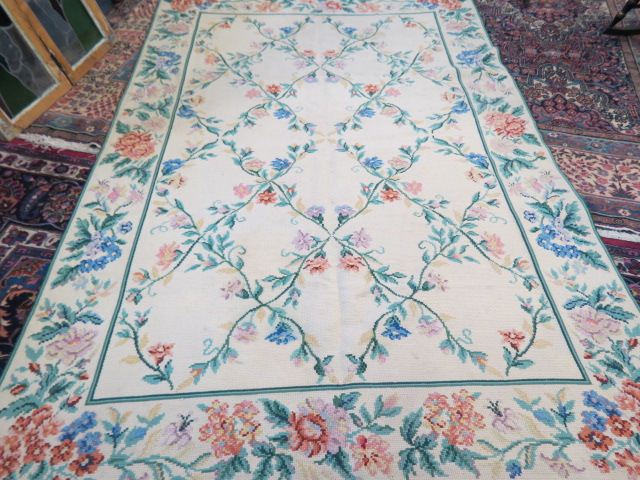 Appraisal: Needlepoint Handmade Rug floral on ivory ' X '