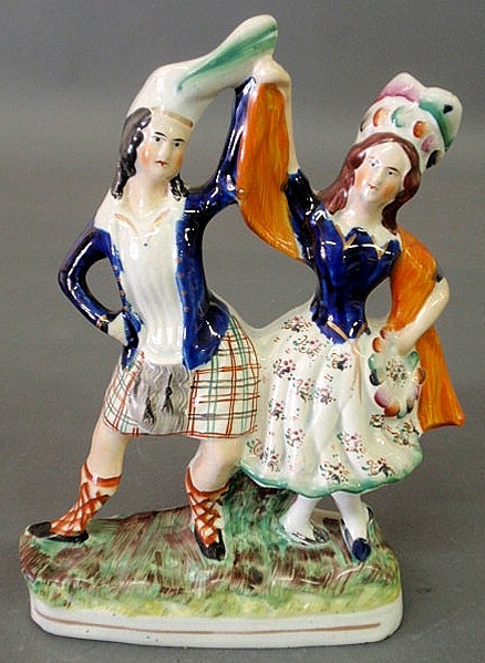 Appraisal: Staffordshire figural group of Highland dancers h x w