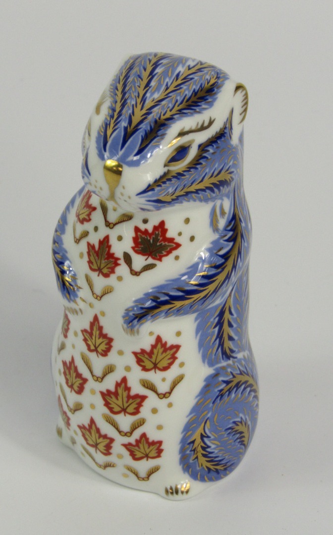 Appraisal: A Royal Crown Derby Imari porcelain paperweight modelled as the