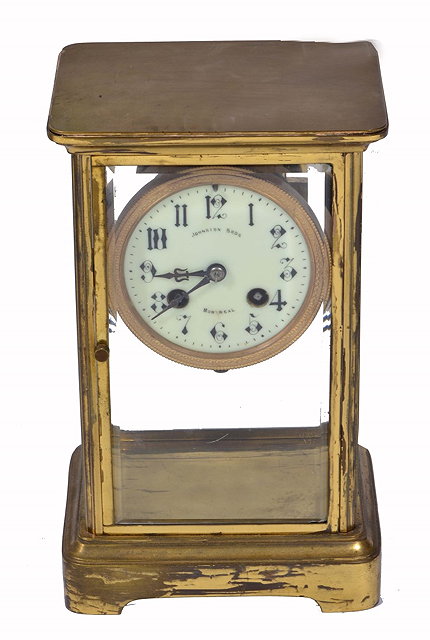 Appraisal: A FRENCH FOUR GLASS MANTEL CLOCK with enamel dial signed