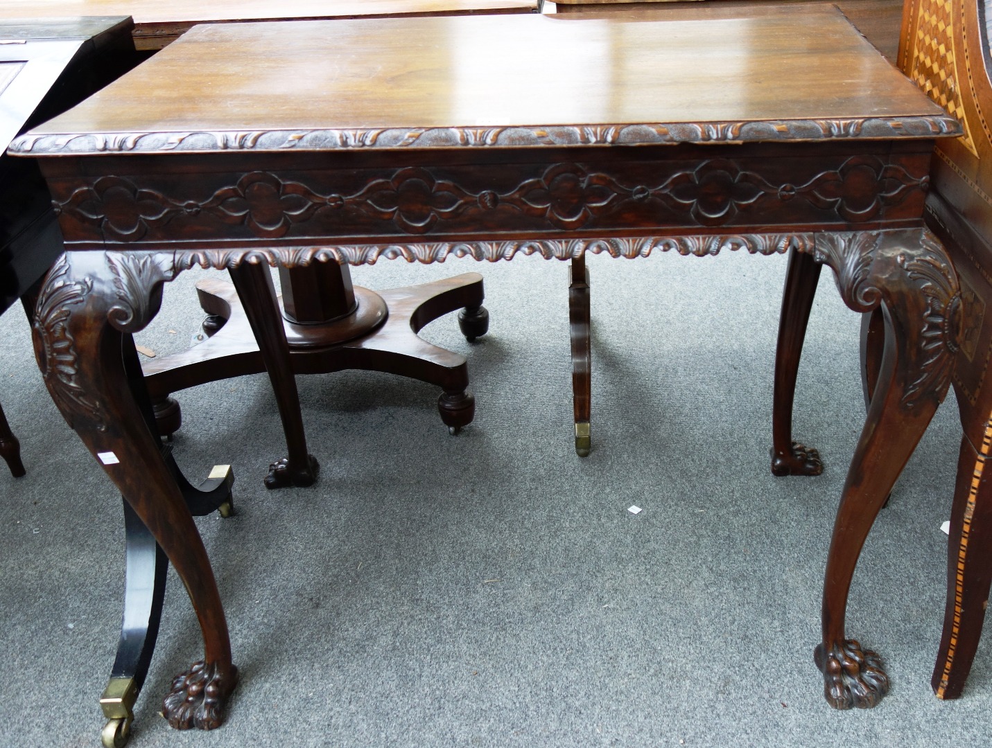 Appraisal: A mid th century style hardwood rectangular centre table with