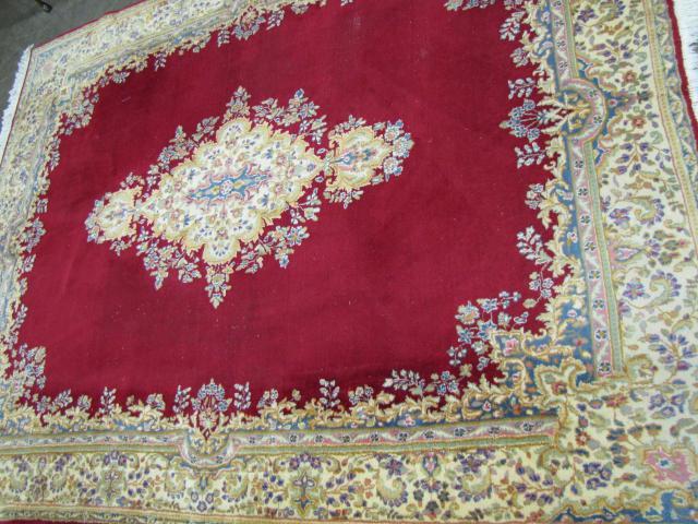 Appraisal: Vintage Persian Kerman ' x '' red field with cream