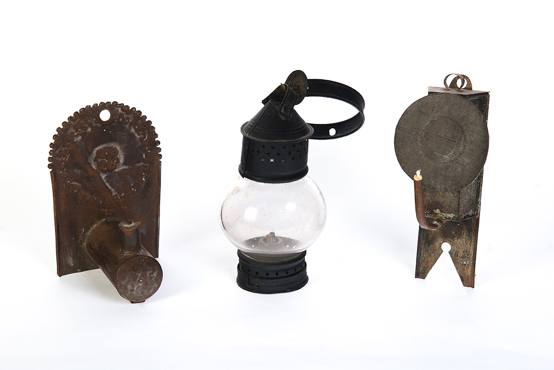 Appraisal: THREE PIECES OF EARLY TIN LIGHTING American th century Lantern