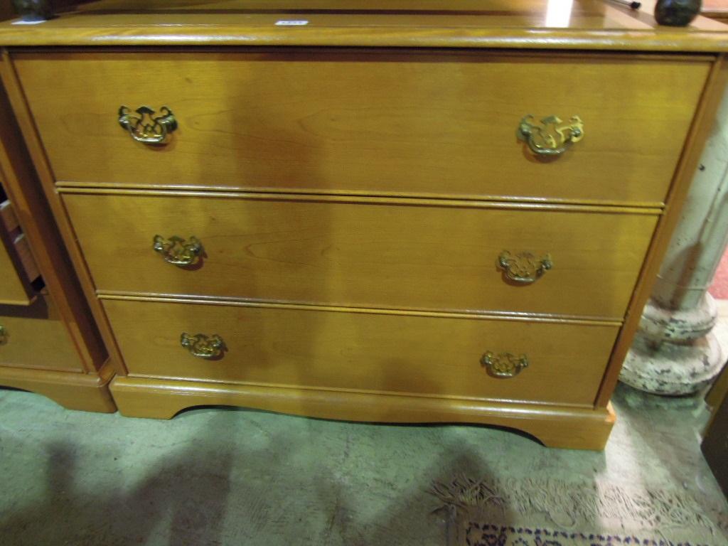 Appraisal: A modern Stag chest fitted with three long drawers together