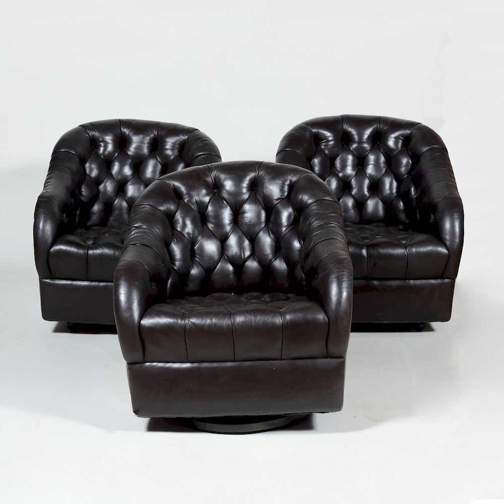 Appraisal: Three Tufted Leather Club Chairs in the Style of Ward