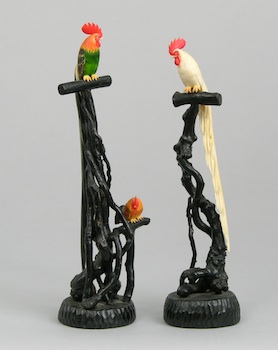 Appraisal: A Pair of Fancy Roosters Two roosters carved of ivory