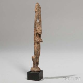 Appraisal: Dogon Standing Hermaphrodite Figure with hands over the head encrusted