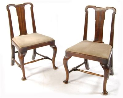 Appraisal: A pair of George II walnut side chairs having a