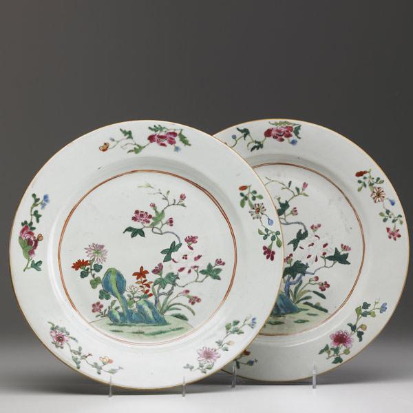 Appraisal: CHINESE EXPORT Pair of chargers both with floral decoration ca