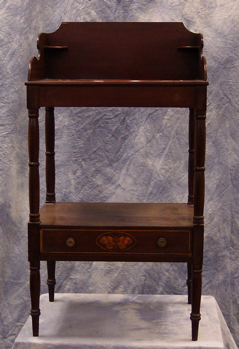 Appraisal: Mahogany Sheraton open washstand with a butterfly inlaid drawer some