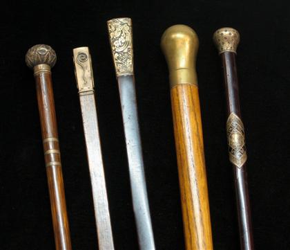 Appraisal: Group of five walking sticks with sterling and brass handles