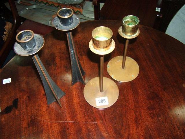 Appraisal: Two pairs of Scandinavian designer candlesticks