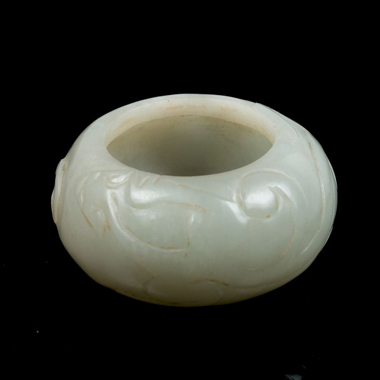 Appraisal: CELADON JADE WATER POT The water pot of compressed globular