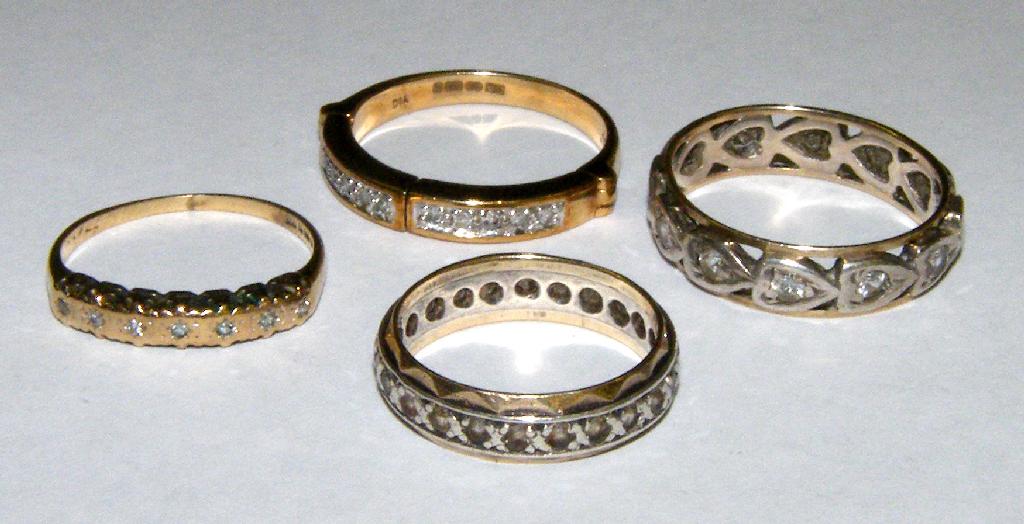 Appraisal: Four various ct eternity rings gm