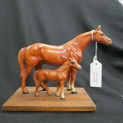 Appraisal: Hubley Cast Iron Figurine of Mare Colt wood base all