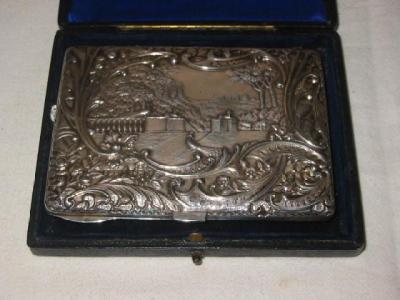 Appraisal: AN EDWARDIAN CARD CASE of oblong form embossed with fete