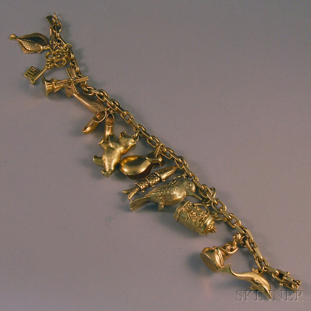 Appraisal: kt Gold Charm Bracelet hung with a variety of mostly