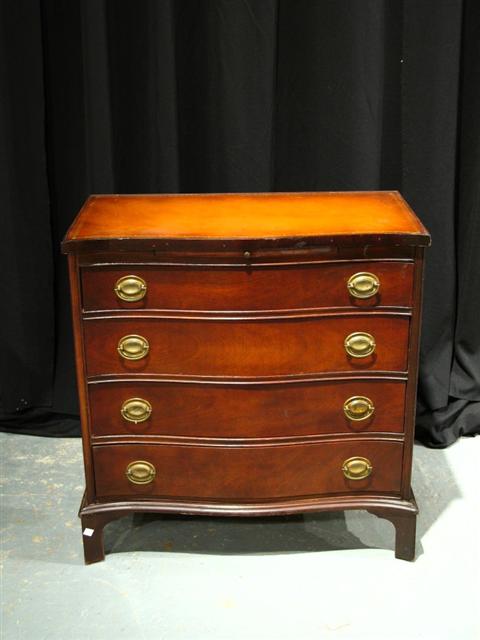 Appraisal: GEORGIAN STYLE LEATHER MAHOGANY CHEST th century the serpentine leather