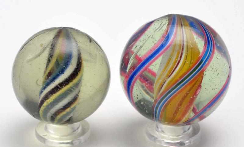 Appraisal: Lot of Solid Core Swirl Marbles Description The smaller marble