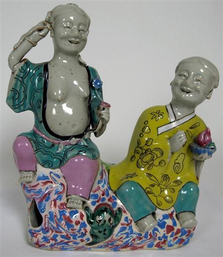 Appraisal: An th century Chinese famille rose figure group depicting the