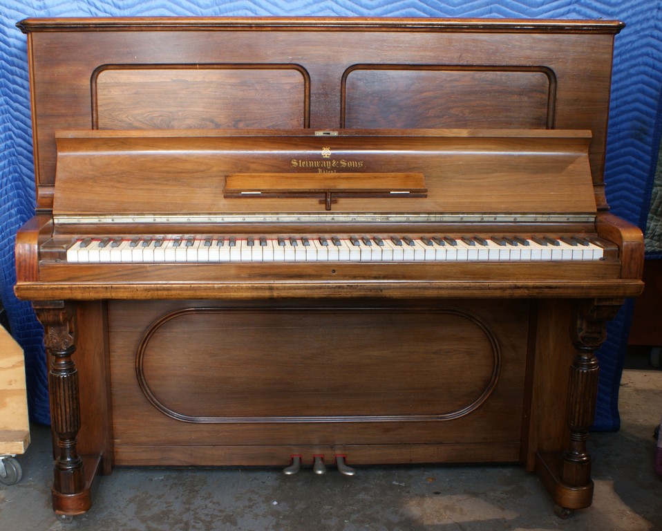 Appraisal: Steinway upright rosewood console piano new pinblock refinished with bench