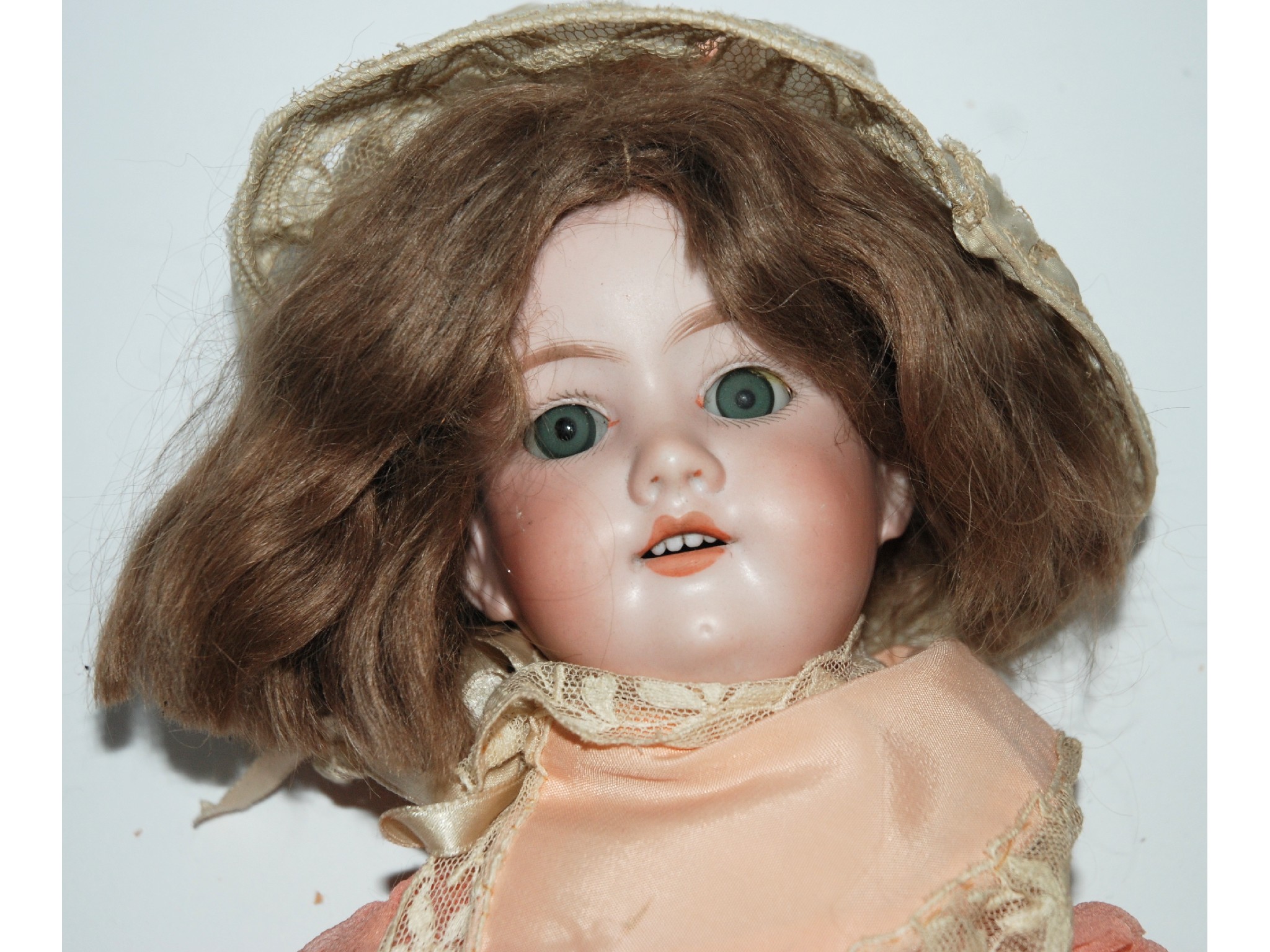 Appraisal: An Armand Marseille bisque-headed dollwith fixed blue eyes open mouth