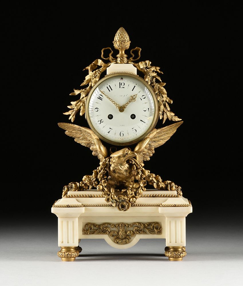 Appraisal: A LOUIS XVI STYLE ORMOLU MOUNTED WHITE MARBLE MANTLE CLOCK