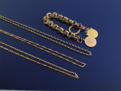 Appraisal: Two gold chains g And a bracelet with another chain