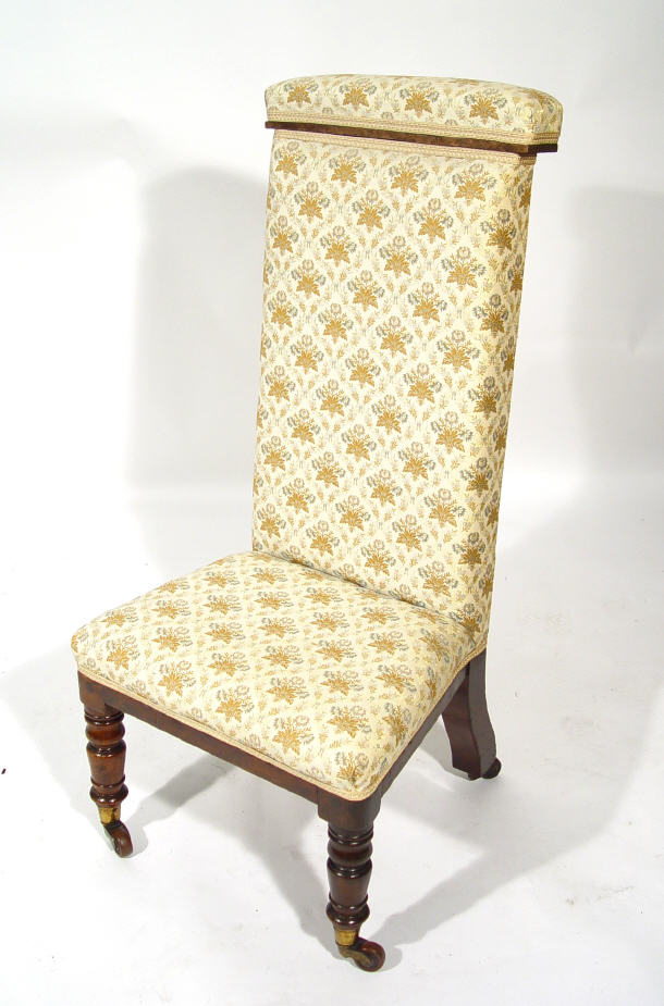 Appraisal: Victorian mahogany nursing chair with floral upholstery