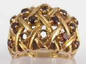 Appraisal: A carat gold garnet ring two stones missing approx mm