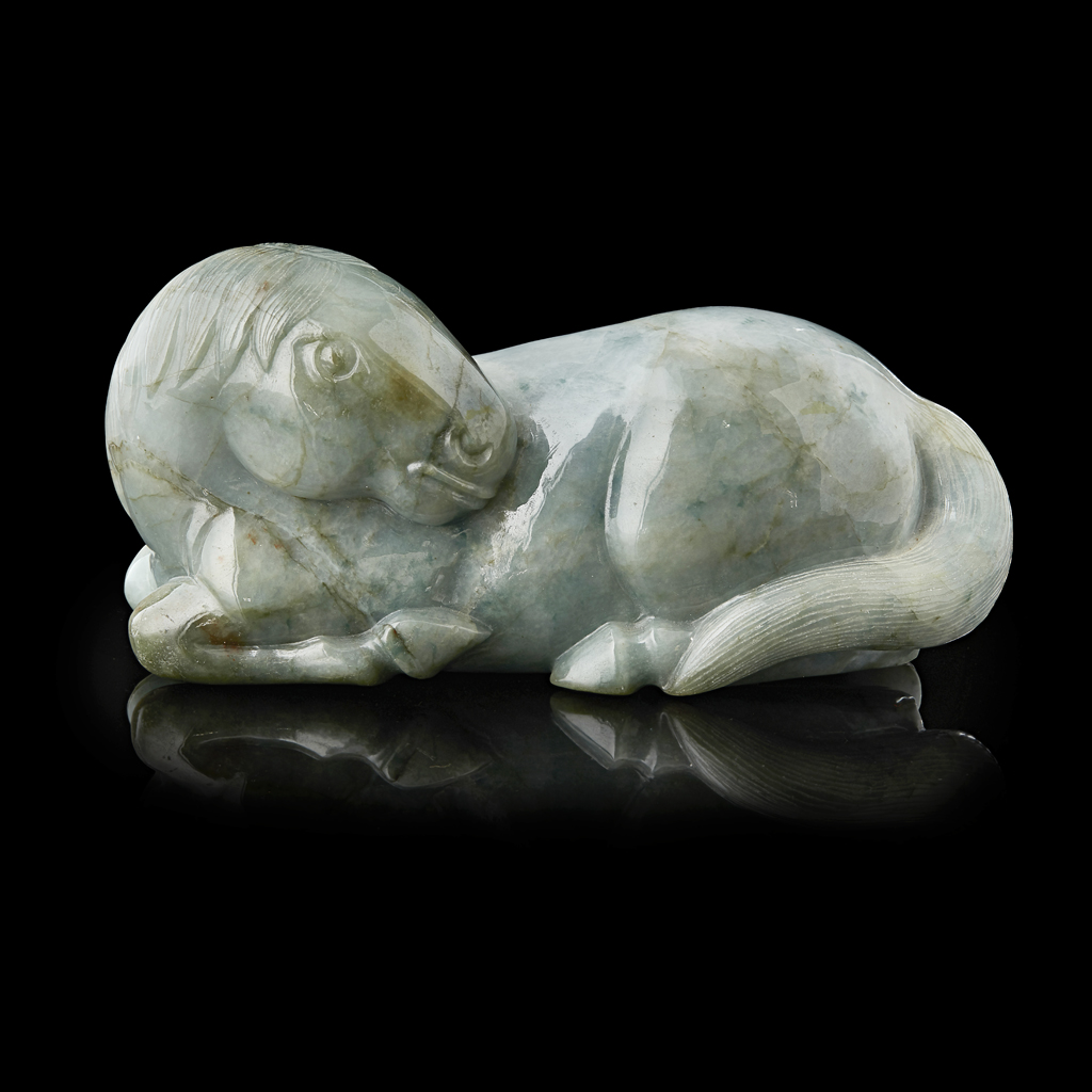 Appraisal: JADEITE FIGURE OF A RECUMBENT HORSE the horse shown in