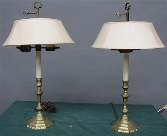 Appraisal: PAIR OF LAMPS A pair of antique engraved brass candlesticks