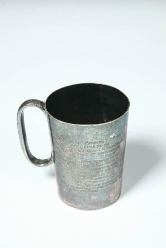 Appraisal: SILVER-PLATED RELIC MUG Marked for James Deakins and Sons Sheffield