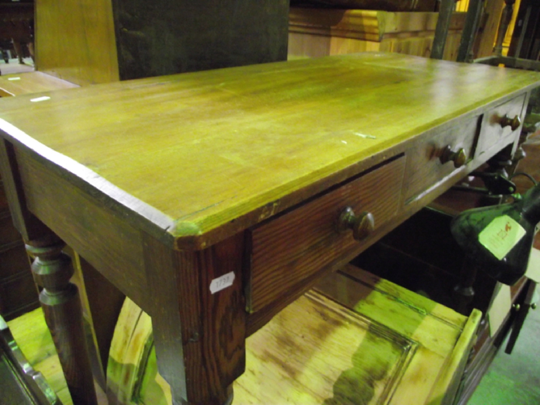 Appraisal: A Victorian pitch pine side table fitted with three frieze