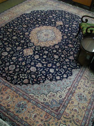 Appraisal: Tabriz room size oriental rug c 's x navy field