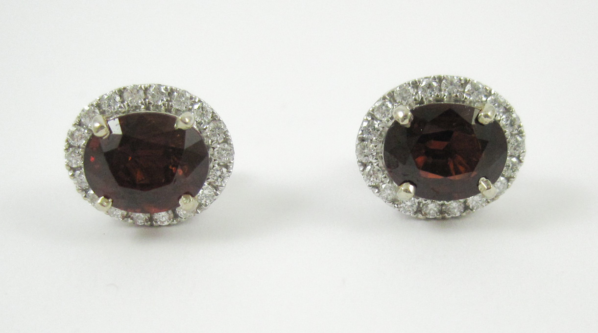 Appraisal: PAIR OF PYROPE GARNET AND DIAMOND EARRINGS each k white