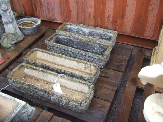 Appraisal: Four reconstituted stone rectangular garden planters two stamped 'Cottswold studio