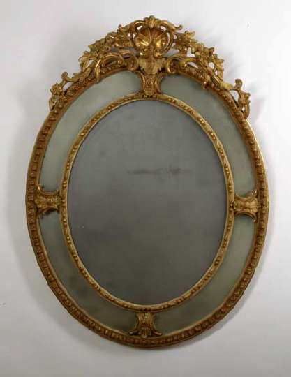 Appraisal: Louis XIV-Style Giltwood Looking Glass mid- th century the oval