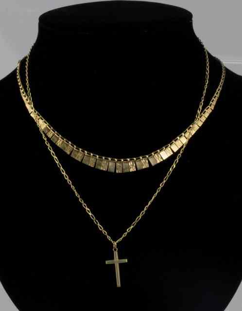 Appraisal: A ct gold fringe necklace of graduated textured panels approximately