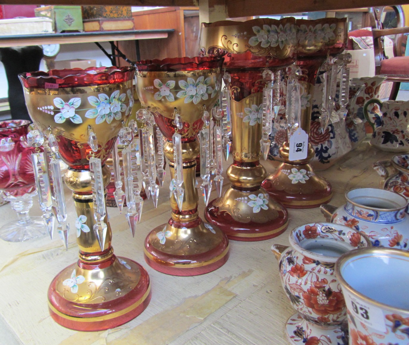 Appraisal: A pair of Czechoslovakian ruby glass and gilt table lustres