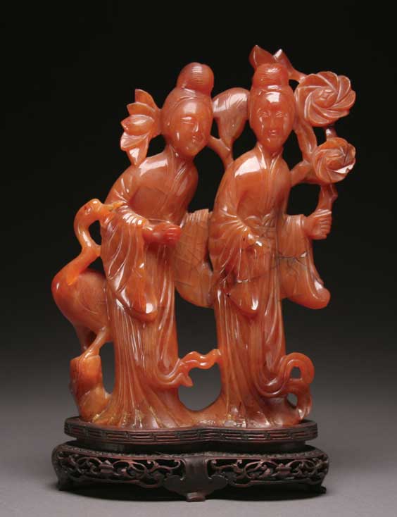 Appraisal: CARVED CARNELIAN GROUP Well carved Chinese carnelian figural group of