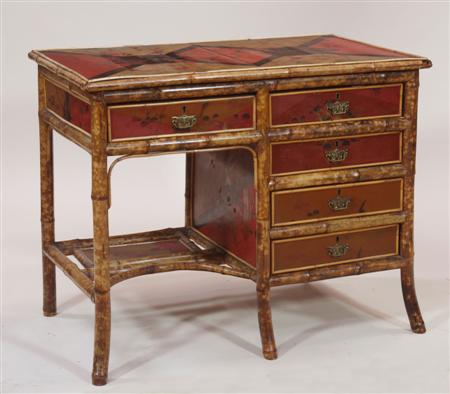 Appraisal: A faux bamboo dressing table the rectangular top over a