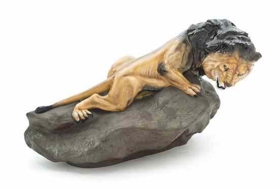 Appraisal: A Royal Doulton Porcelain Figure depicting a lion striding across