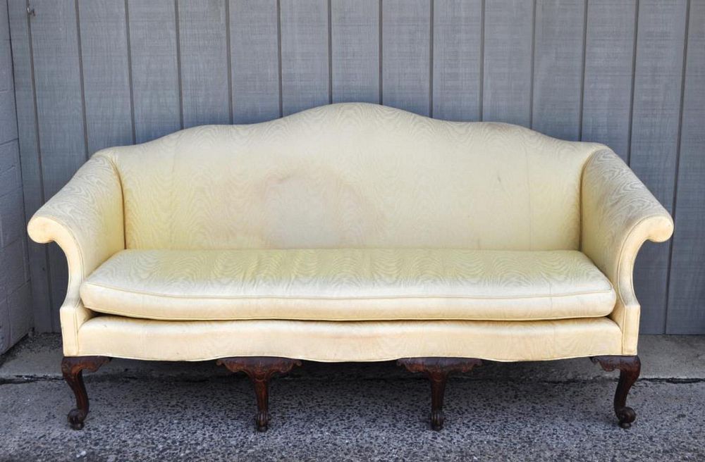 Appraisal: Triple Serpentine Georgian Style Camelback Sofa with carved claw and